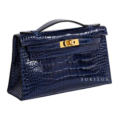 mini kelly hermes crocodile|kelly pochette price 2022.